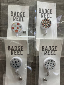 CLEARANCE BADGE REELS